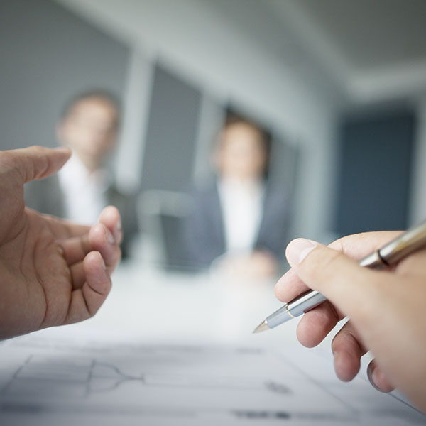 Close-up of hands gesturing during lawyer meeting